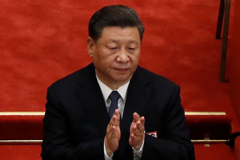 Chinese President Xi Jinping attends the opening session of NPC in Beijing