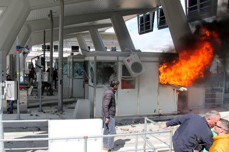 Protesters set toll booths on fire on the Durres-Kukes highway in Kalimash near Kukes, Albania March 31, 2018. REUTERS/Stringer