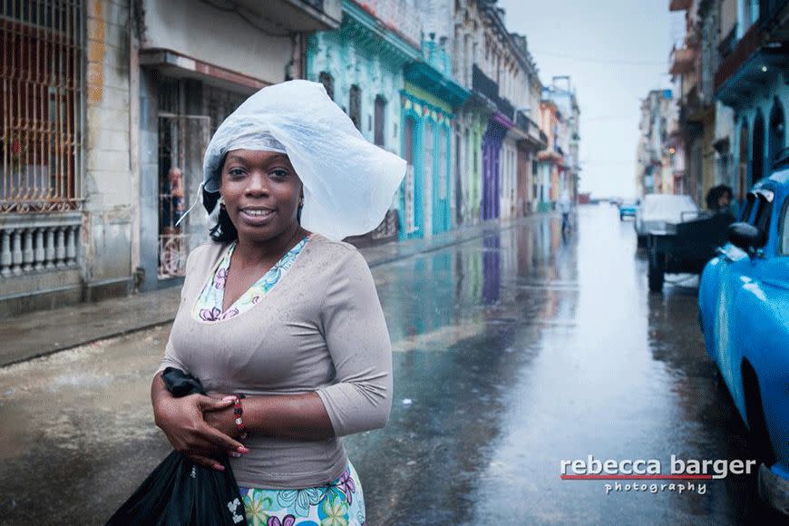 As the rain slowed, this beautiful young woman stopped me in the street to investigate my raincoat, apparently, an unknown piece of clothing in Cuba. I didn't give her my coat, but I did have a bag of clothing I was planning to donate so I gave it to her. Two days later she recognised me on the street and stopped to say thank you, and she was wearing the clothes I donated!