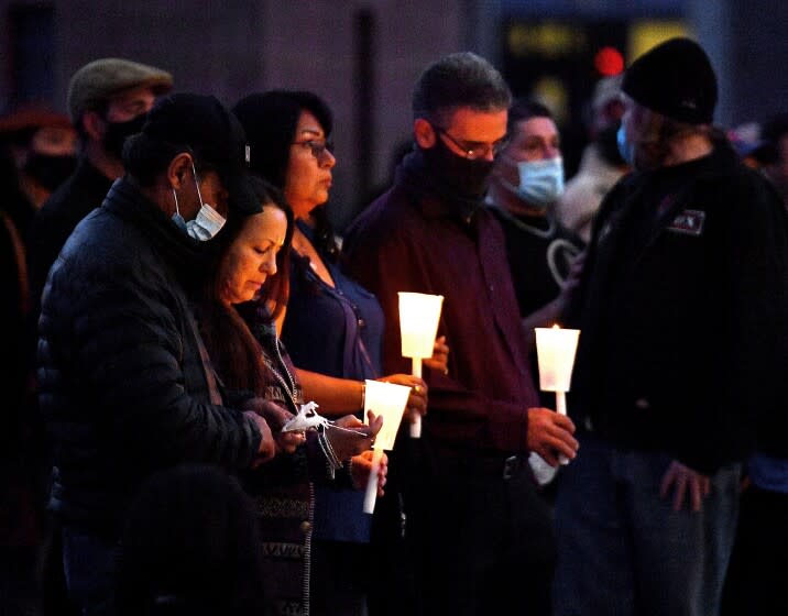 ALBUQUERQUE, NEW MEXICO - OCTOBER 23: People hold candles as they attend a vigil held to honor cinematographer Halyna Hutchins at Albuquerque Civic Plaza on October 23, 2021 in Albuquerque, New Mexico. Hutchins was killed on set while filming the movie "Rust" at Bonanza Creek Ranch near Santa Fe, New Mexico on October 21, 2021. The film's star and producer Alec Baldwin discharged a prop firearm that hit Hutchins and director Joel Souza. (Photo by Sam Wasson/Getty Images)