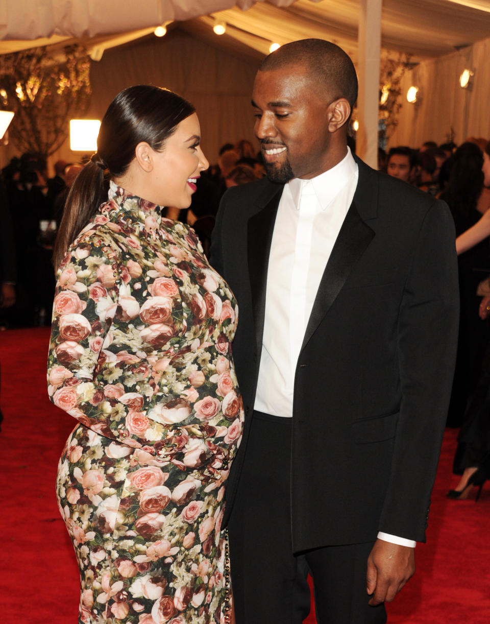 Kim Kardashian, left, and Kanye West attend The Metropolitan Museum of Art's Costume Institute benefit celebrating "PUNK: Chaos to Couture" on Monday, May 6, 2013, in New York. (Photo by Evan Agostini/Invision/AP)