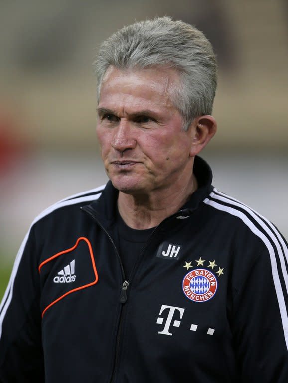 Bayern Munich manager Jupp Heynckes watches his side play a friendly in Doha on January 5, 2013. Heynckes, whose contract expires in June, just after his 68th birthday, will make way at the end of the season for Pep Guardiola