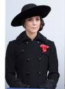 <p>In England, the poppy is a sign of remembrance, and it’s used to honor military personnel who have died in war. Kate wore it with an all-black outfit to a Remembrance Sunday Service in 2016. </p>