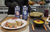 Bottles of Nestle new product, a milk alternative made from yellow peas called "Wunda", are pictured in Lausanne