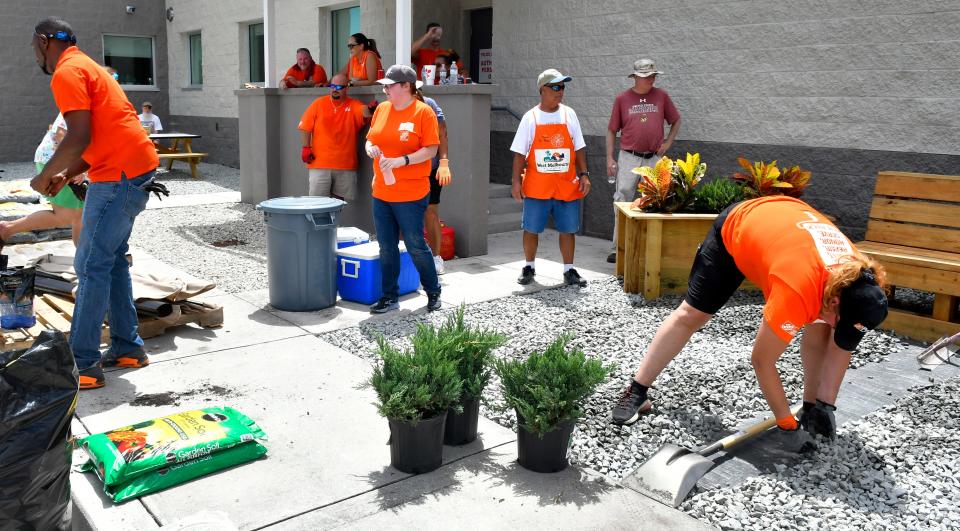 A memorial garden is created in memory of West Melbourne Police Capt. Carlos Navedo, who died unexpectedly on June 4, 2022. Dozens of volunteers, spearheaded by workers from the West Melbourne Home Depot, along with several members of City Council, Police Department and others, made this memorial garden at the  police station Aug. 15, 2022.