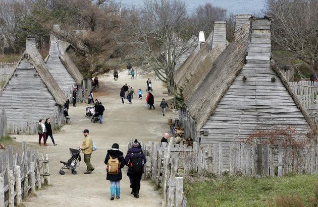 Visitors walk through the 17th-century English village exhibit at the Plimoth Patuxet Museums on Nov. 18, 2018, in Plymouth, Mass. (Photo: AP Photo/Steven Senne, File)