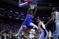 Philadelphia 76ers' Joel Embiid (21) dunks during the first half of an NBA basketball game against the Orlando Magic, Wednesday, Feb. 1, 2023, in Philadelphia. (AP Photo/Matt Slocum)