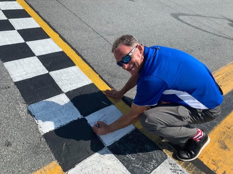 Matanzas High School Principal Jeff Reaves prepares the finish line at Daytona International Speedway for the 2020 graduates, congratulating them on their high school careers. (Photo: Jeff Reaves)