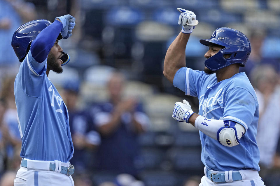 Kansas City Royals' Edward Olivares, right, celebrates with Maikel Garcia after hitting a two-run home run during the fifth inning of a baseball game against the Chicago White Sox Monday, Sept. 4, 2023, in Kansas City, Mo. (AP Photo/Charlie Riedel)