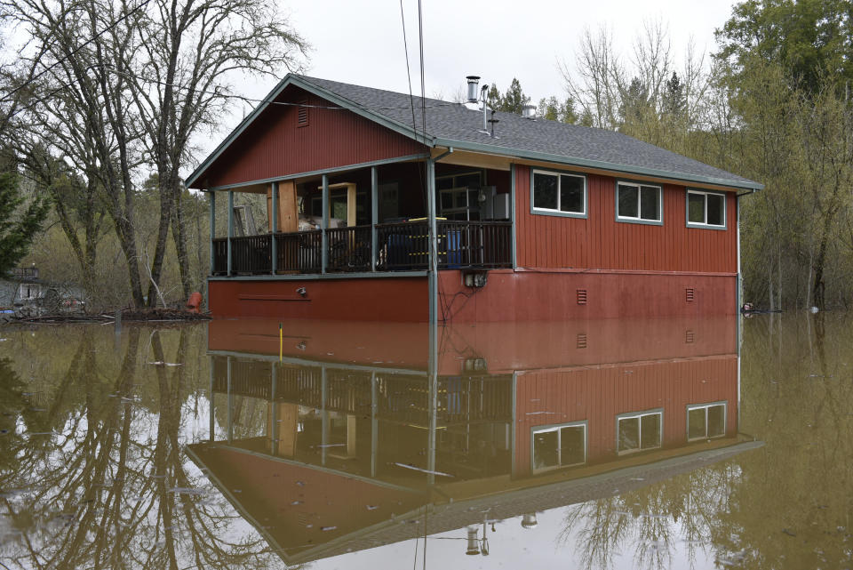 Flood waters from the Russian River surround a home in Forestville, Calif., on Feb. 27, 2019. (Photo: Michael Short/AP)