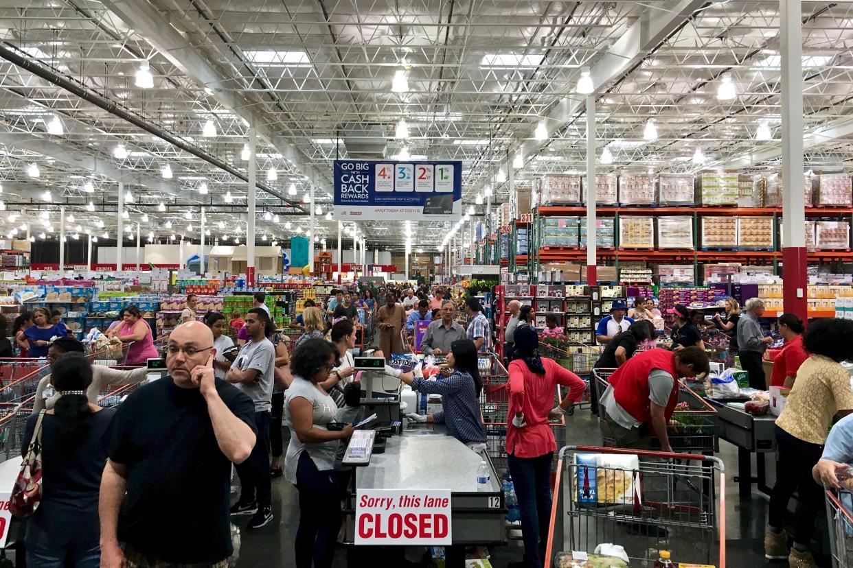 Costco Wholesale showing a large influx of shoppers, creating long checkout lines