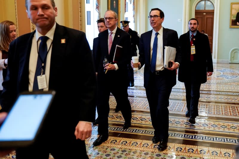 U.S. Secretary of the Treasury Mnuchin walks after a meeting for a coronavirus relief package in Washington