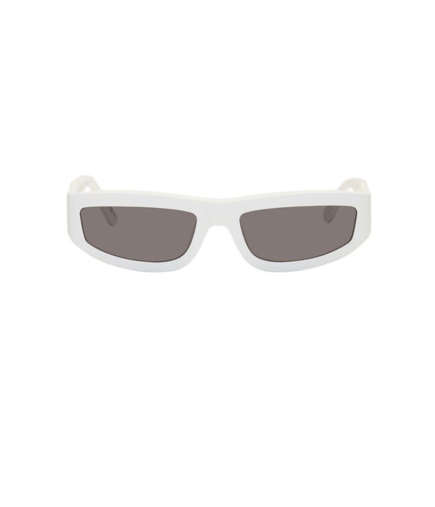 <p>Slim rectangular glasses, $250, <a rel="nofollow noopener" href="https://www.ssense.com/en-us/women/product/stella-mccartney/white-slim-rectangular-sunglasses/2740538?clickref=1011l4CL2pka&utm_source=PH_1100l16177&utm_medium=affiliate&utm_content=0&utm_term=" target="_blank" data-ylk="slk:ssense.com;elm:context_link;itc:0;sec:content-canvas" class="link ">ssense.com</a> </p>