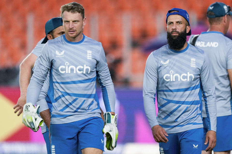 England's captain Jos Buttler, left and Moeen Ali during a practice session ahead of their match of ICC Men's Cricket World Cup against New Zealand in Ahmedabad, India, Wednesday, Oct. 4, 2023. Cricket World Cup begins on Thursday, Oct. 5. (AP Photo/Ajit Solanki)