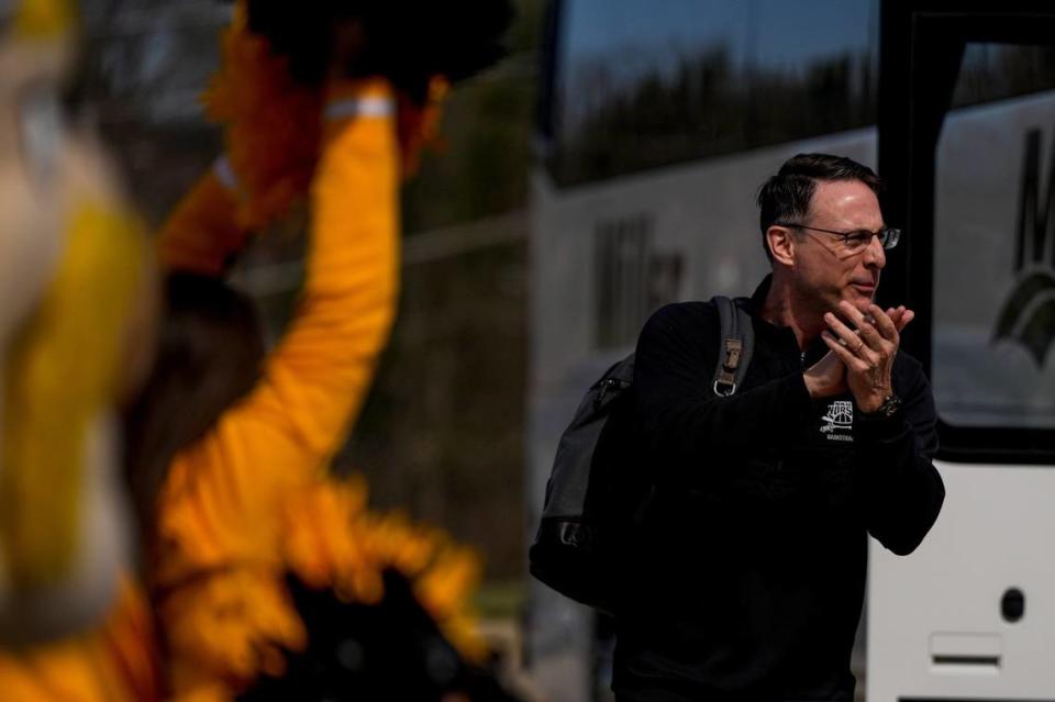 Head coach Darrin Horn smiles as fans cheer on the team’s return to campus in Highland Heights on March 8 after the Norse earned an automatic berth to the NCAA Tournament with with a win against Cleveland State in the Horizon League Tournament finals. Nku Norse Championship Return