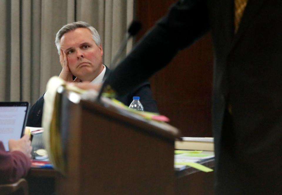 Epic co-founder Ben Harris listens to testimony Thursday at his preliminary hearing in Oklahoma County District Court.