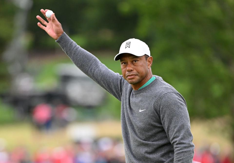 TIger acknowledges the gallery after finishing the second day of play at this past week's JP McManus Pro-Am in Ireland.