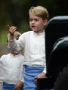 <p>He appeared to be showing them all where to go as they made their way into the church. Photo: Australscope </p>