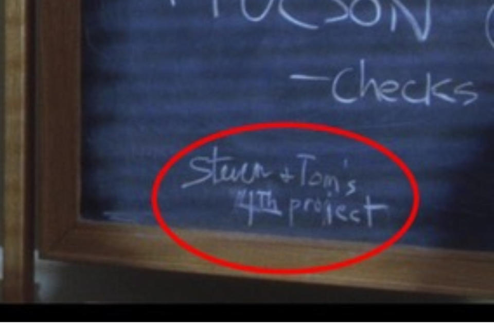 Close up of a chalkboard with "steven and tom's 4th project" written on it