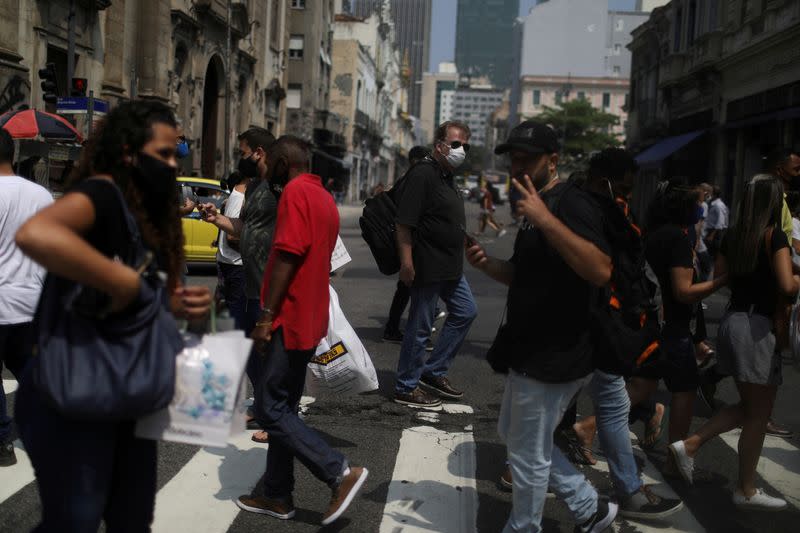 People walk around the Saara street market, amid the outbreak of the coronavirus disease (COVID-19), in Rio de Janeiro