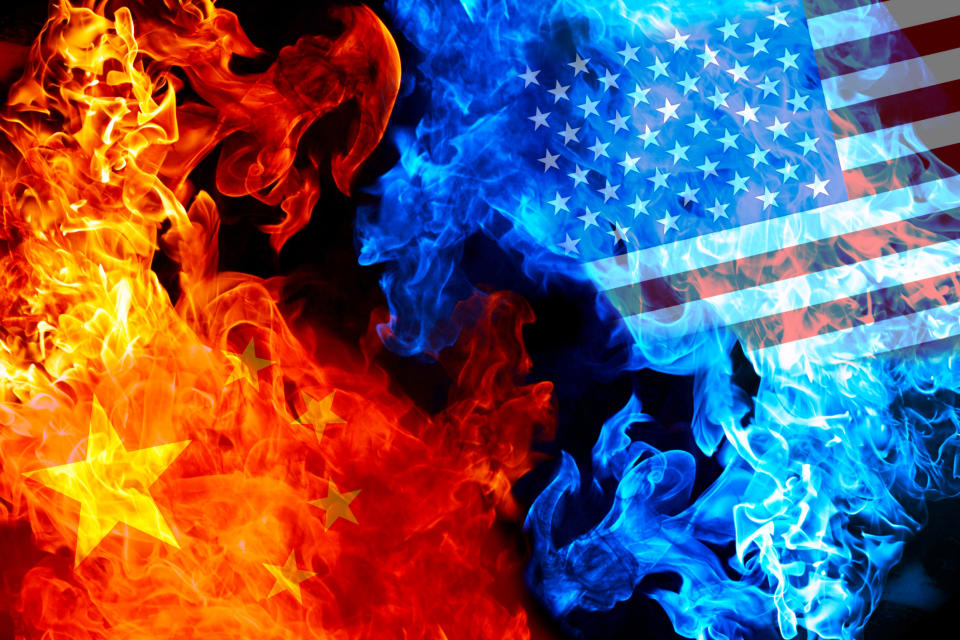 Representations of flags from US and China in fire and smoke