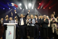 French far right presidential candidate Eric Zemmour, waves after his first rally, Sunday, Dec. 5, 2021 in Villepinte, north of Paris. Far-right former French TV pundit Eric Zemmour is holding his first campaign rally, a few days after he formally declared his candidacy for April's presidential election in a video relaying his anti-migrants, anti Islam views. A first round is to be held on April, 10, 2022 and should no candidate win a majority of the vote in the first round, a runoff will be held between the top two candidates on April 24, 2022. (AP Photo/Rafael Yaghobzadeh)