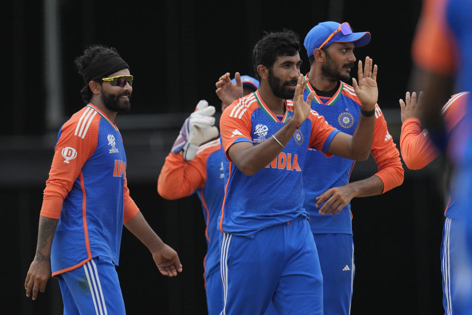 India's Jasprit Bumrah, center, celebrates with teammates after the dismissal of South Africa's Marco Jansen during the ICC Men's T20 World Cup final cricket match between India and South Africa at Kensington Oval in Bridgetown, Barbados, Saturday, June 29, 2024. (AP Photo/Ricardo Mazalan)