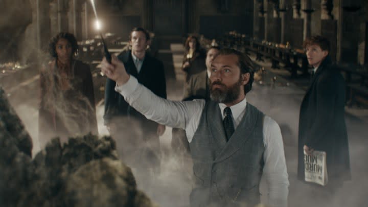 Jude Law and the cast of Fantastic Beasts: The secrets of Dumbledore gather in a cave.