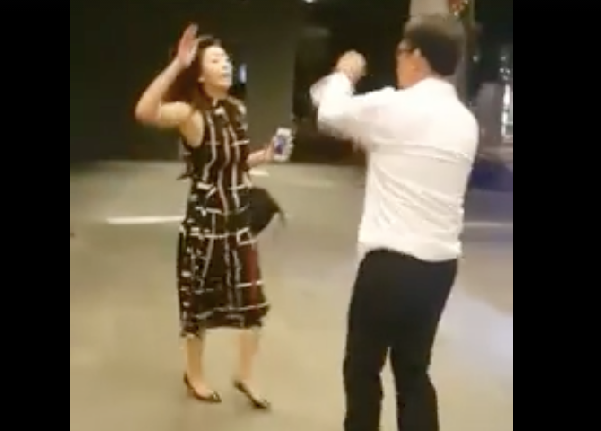 In this Facebook video, the woman was seen hitting a man. In another video, she was seen kicking a security guard at Enggor Street and attempting to assault a taxi driver. (Photo: Screengrab from Facebook video: Issac Cheng)