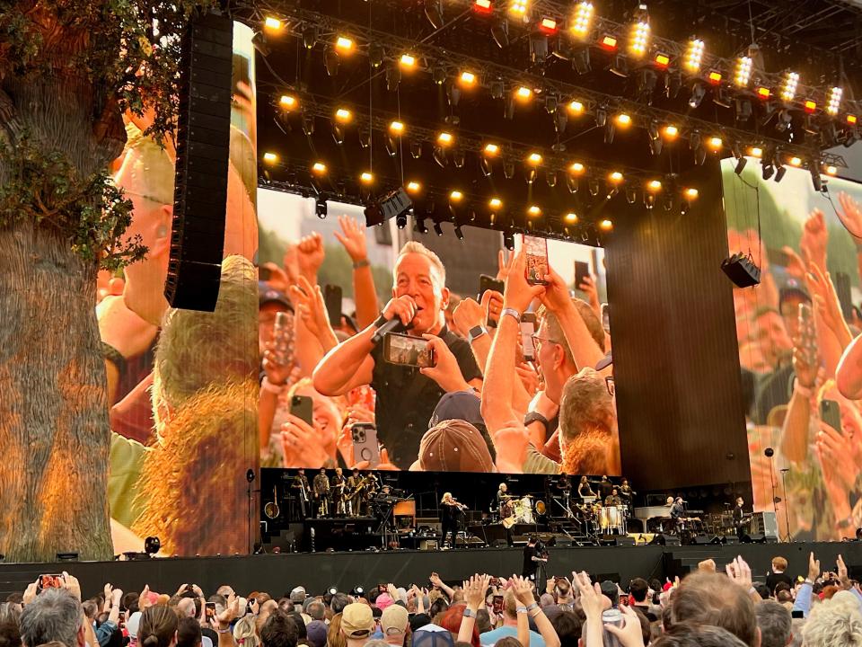 Bruce Springsteen bounds into the crowd (and a sea of cellphones) during his Saturday show at Hyde Park in London.