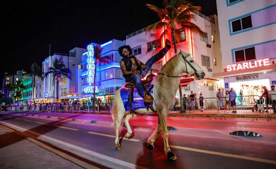 Spring breaker Stephen Harmon rides Tango on Ocean Drive while visiting South Beach from South Carolina on Miami Beach, Florida on Friday, March 8, 2024