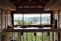 Ri Kynjai Shillong. Photo: Tom Parker - There’s nothing more romantic than a monsoon break in idyllic natural surroundings—which is why Ri Kynjai is the perfect honeymoon spot. Located in the Cherrapunjee-Mawsynram district—one of the world’s rainiest areas—the resort has been designed in Khasi style, with upturned boat-shaped roofs to shrug off excess water. The pine-panelled rooms have balconies overlooking the serene Umiam Lake.