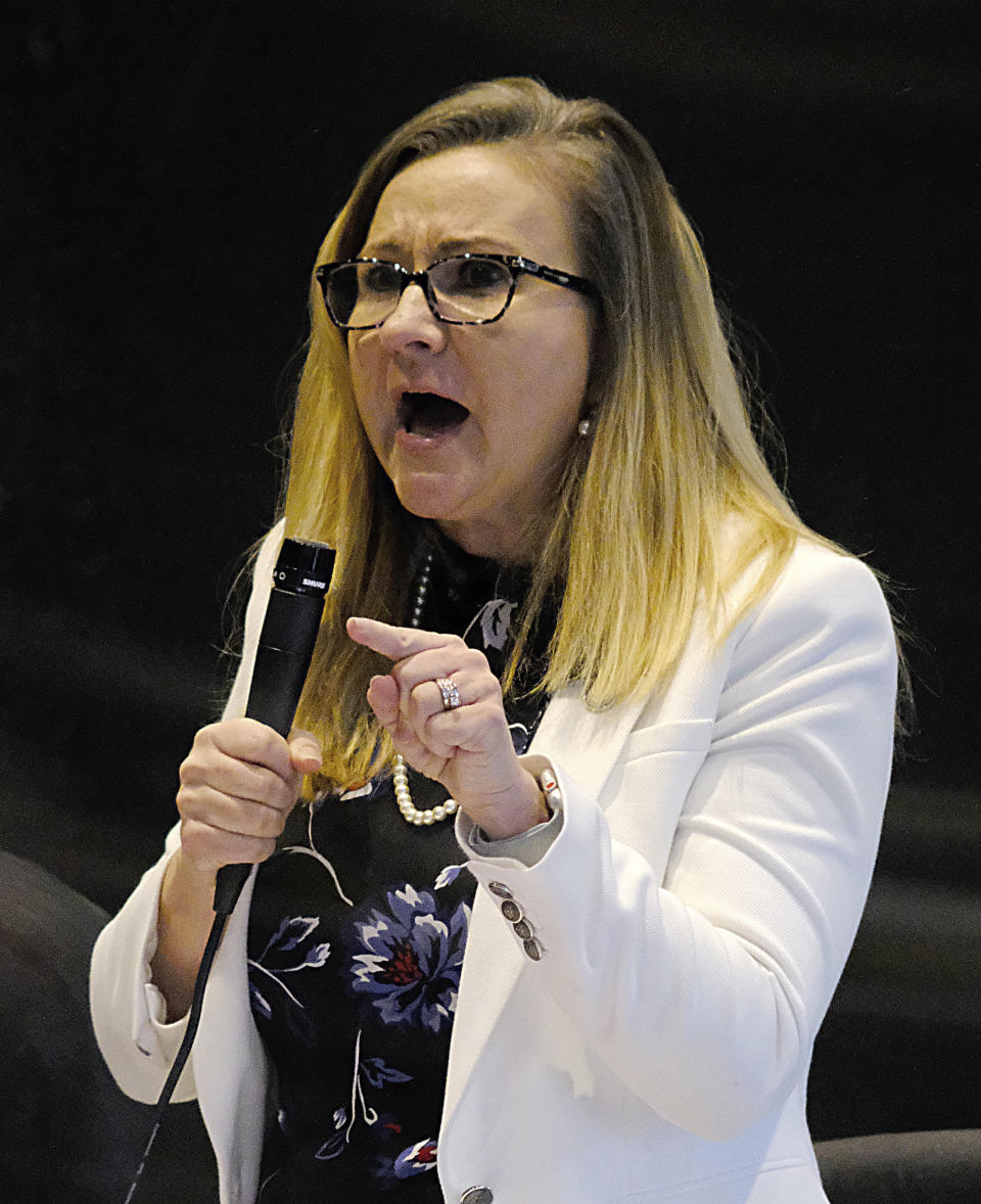 Sen. Amanda Chase, R-Chesterfield, speaks vigorously against passage of SR91, the resolution censuring her during the floor session of the Virginia Senate inside the Science Museum in Richmond, Va. Tuesday, Jan. 26, 2021. (Bob Brown/Richmond Times-Dispatch via AP)