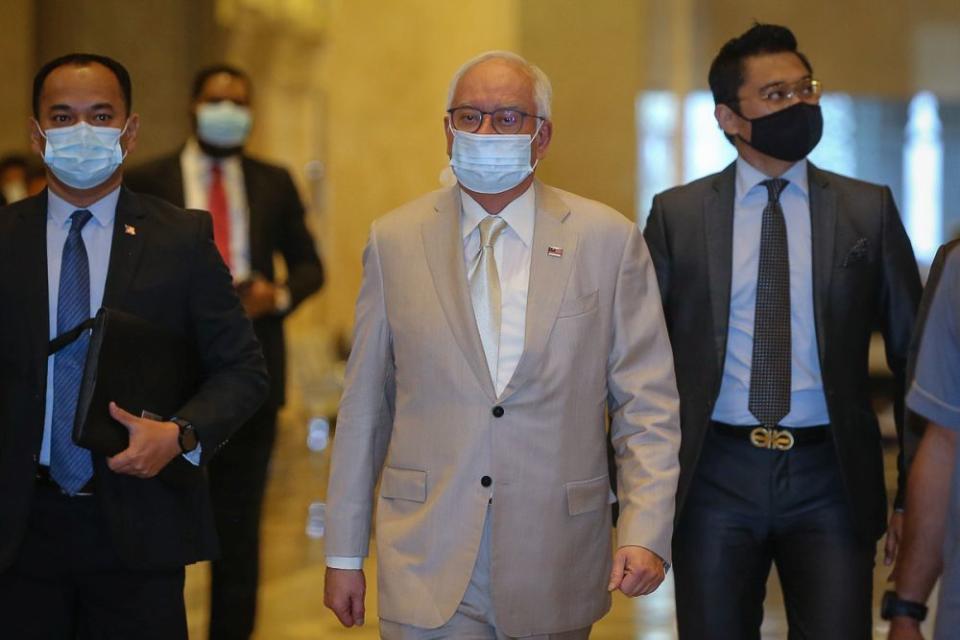 Datuk Seri Najib Razak arrives at the Court of Appeal in Putrajaya April 20, 2021. — Picture by Yusof Mat Isa