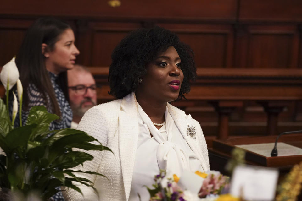 Democratic floor leader Rep. Joanna McClinton stands on the floor as legislators of the Pennsylvania House of Representatives are sworn-in, Tuesday, Jan. 3, 2023, at the state Capitol in Harrisburg, Pa. The ceremony marks the convening of the 2023-2024 legislative session of the General Assembly of Pennsylvania. (AP Photo/Matt Smith)