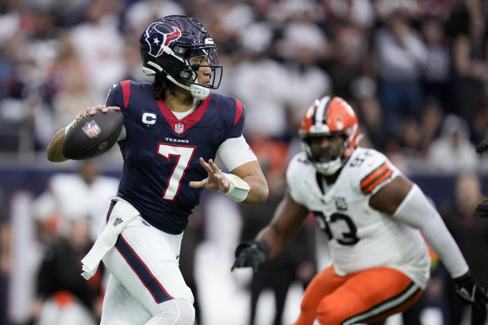 Houston Texans quarterback C.J. Stroud passes against the Cleveland Browns during the first half of an NFL wild-card playoff football game Saturday, Jan. 13, 2024, in Houston. (AP Photo/Eric Christian Smith)