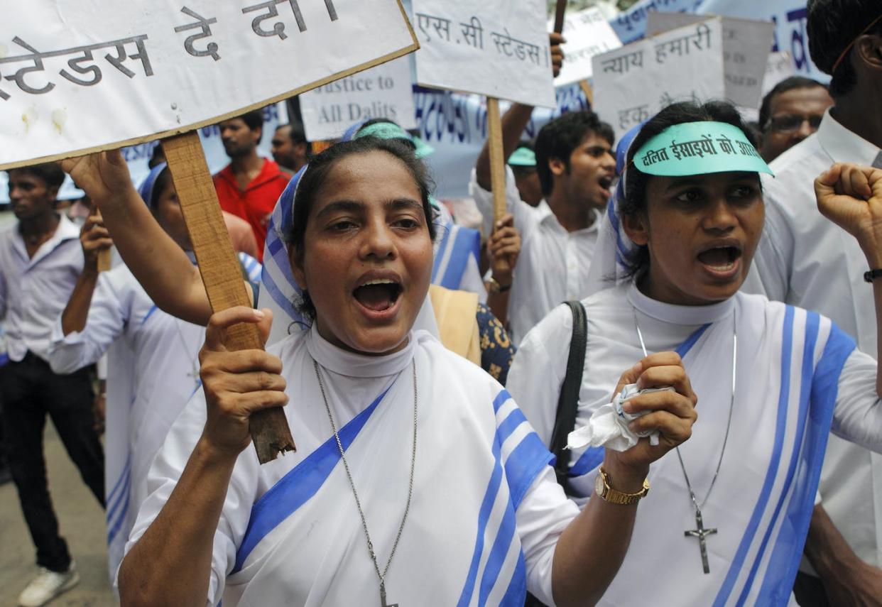 <span class="caption">Nuns from a group of Dalit Christians, or India's lowest caste who converted to Christianity, protest in New Delhi.</span> <span class="attribution"><a class="link " href="https://newsroom.ap.org/detail/IndiaCasteProtest/249f166d16ba461b8f6e2eb43a73b52c/photo?Query=india%20caste&mediaType=photo&sortBy=&dateRange=Anytime&totalCount=966&currentItemNo=57" rel="nofollow noopener" target="_blank" data-ylk="slk:AP Photo/Gurinder Osan;elm:context_link;itc:0;sec:content-canvas">AP Photo/Gurinder Osan</a></span>