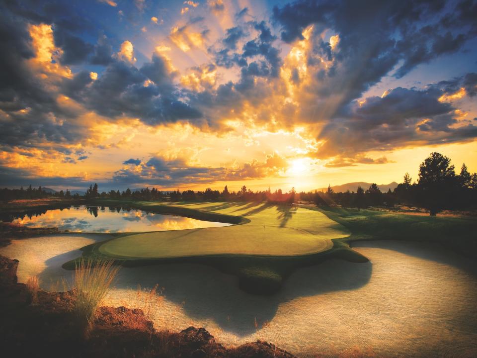 The sun setting over a golf course in Oregon.