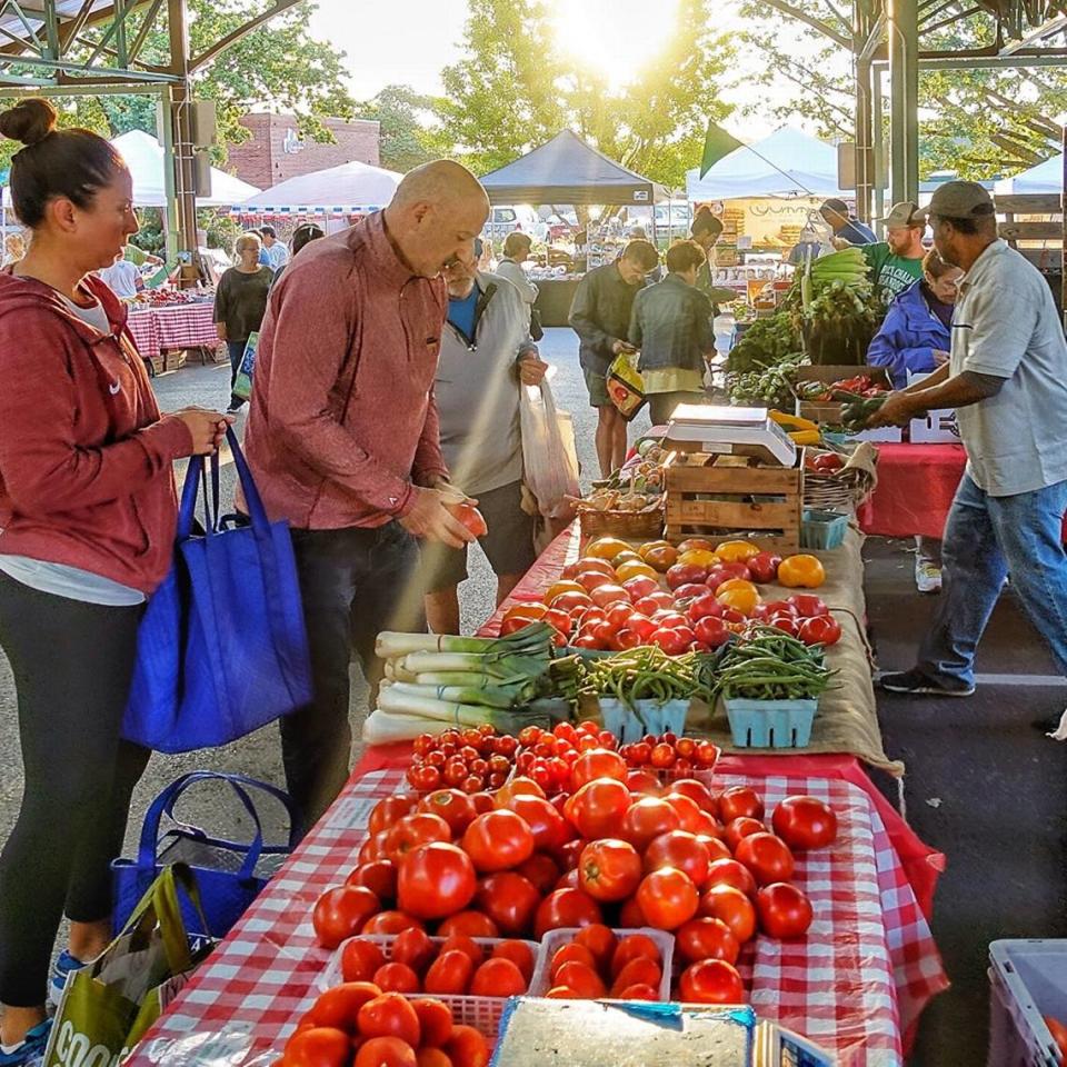 Vendors at the Overland Park Farmers Market offer a wide variety of produce and other goods.