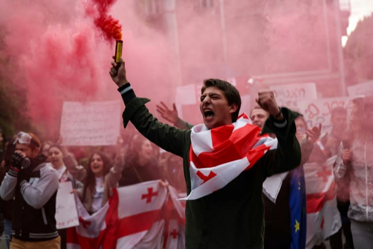 Georgian students stage a march to protest the controversial "foreign influence" bill in Tbilisi on May 13, 2024 (Giorgi ARJEVANIDZE)