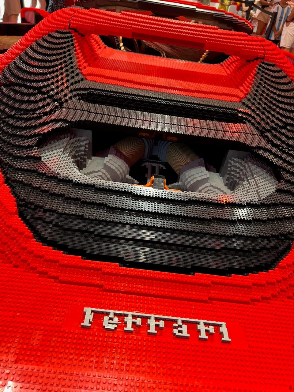 Guests can get behind the wheel of a life-size LEGO Ferrari 296 GTS for photos at LEGOLAND Florida's LEGO Ferrari Build and Race.