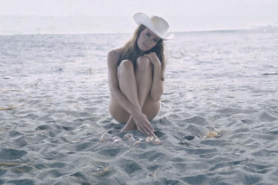 <p>Raquel Welch wearing a cowboy hat to get a little sun protection.</p>