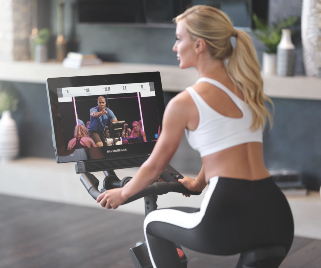 Woman riding a stationary bike