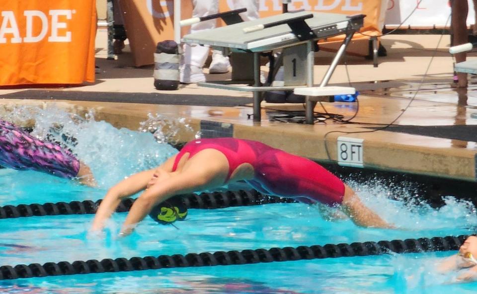 Newbury Park freshman Megan Wang competes in the 100-yard backstroke at the CIF-Southern Section Division 2 swimming championships Friday at the Riverside Community College Aquatic Complex. Wang finished second with a school-record time of 55.92 seconds.