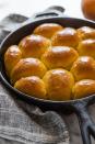 <p>Canned pumpkin mixed into these basic buttery rolls is a great way to up your Thanksgiving game. The in-laws won't forget this one.</p><p><em><a href="https://www.thepioneerwoman.com/food-cooking/recipes/a103574/pumpkin-dinner-rolls/" rel="nofollow noopener" target="_blank" data-ylk="slk:Get the recipe from The Pioneer Woman »;elm:context_link;itc:0;sec:content-canvas" class="link ">Get the recipe from The Pioneer Woman »</a></em></p>