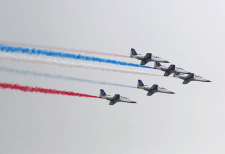 AT-3 jet trainer aircraft perform during the annual Han Kuang military exercise in an army base in Hsinchu, northern Taiwan, July 4, 2015. REUTERS/Patrick Lin