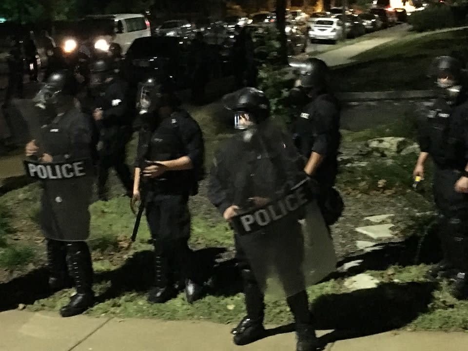 Riot police are seen in St. Louis on Sept. 15. (Photo: Lynn Hunt)