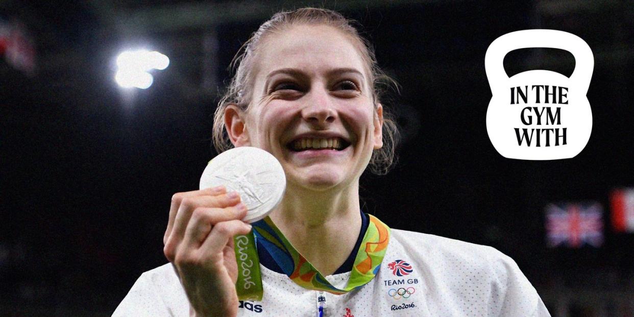 a person holding a medal