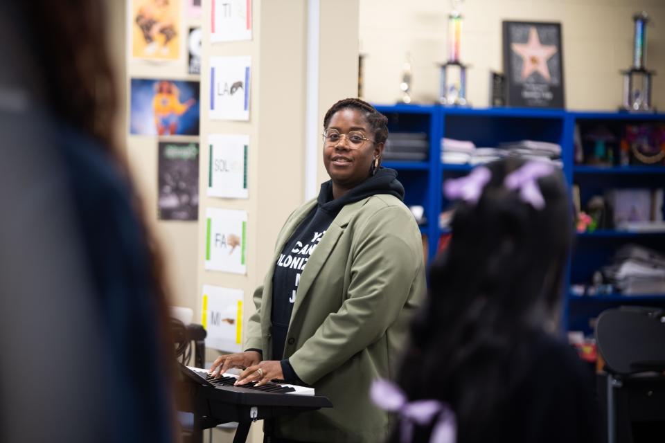 Grammy nominee Jasmine Fripp, a music educator at KIPP Nashville Collegiate High School in Nashville, Tenn., coaches her choir students, Friday, Jan. 12, 2024.