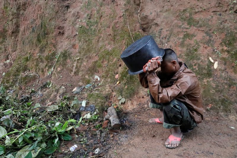 The Wider Image: In Myanmar jungle, civilians prepare to battle military rulers